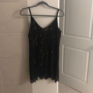 Never been worn black lace dress with nude lining